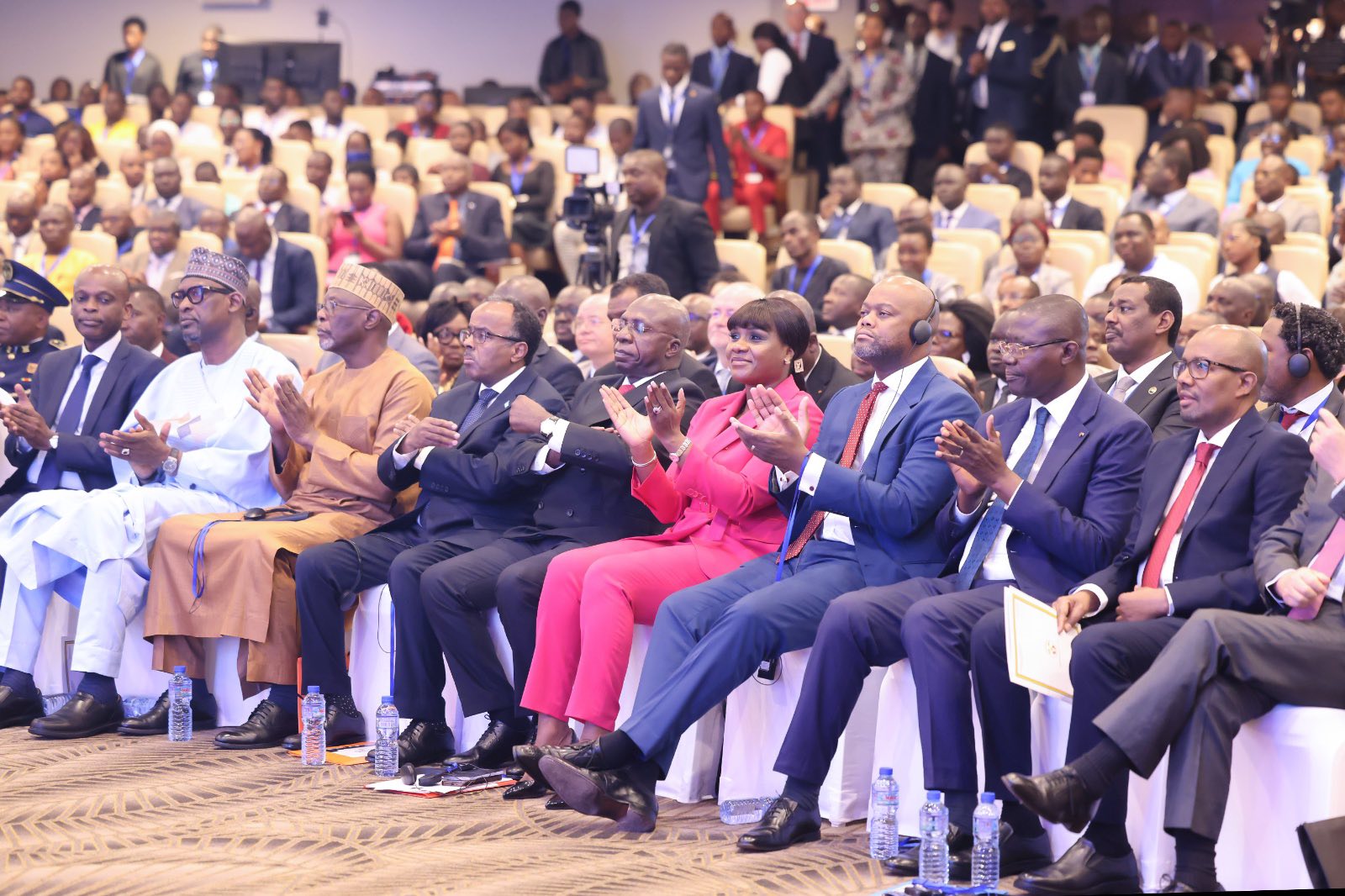 Delegates networking at the AI for Peace Conference